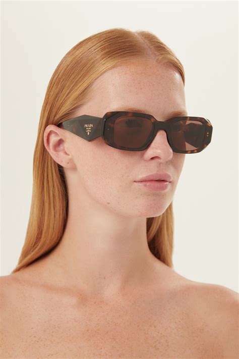 prada symbol black oval sunglasses|Prada sunglasses symbol.